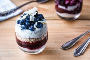mixed-blueberries-with-yogurt-smoothies-chia-seed-and-coconut-on-the-table